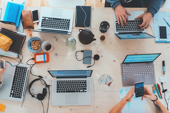 Photo of a team working on computers