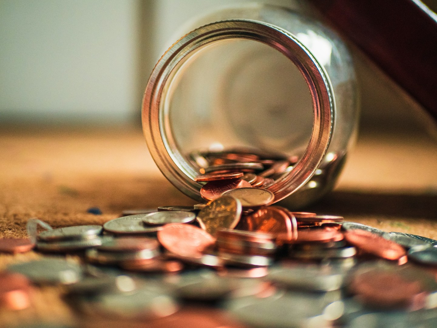 Hidden cost coin jar